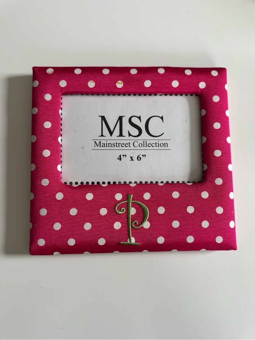 Pink polka dot with green P picture frame